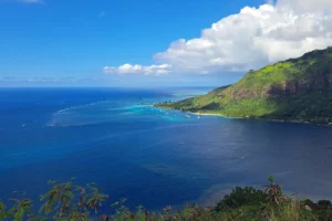 Panoramic view from Magic Mountain over Opunohu Bay, Mareto Ta’ahiamanu Beach and Mount Rotui in Moorea