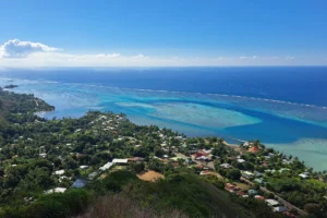 Panoramic view over Papeetoai, the turquoise lagoon and reef from Faa Roa Magic Mountain in Moorea