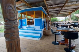Terrace and blue former Tahitian truck of Uaina O2 Coco restaurant in Moorea